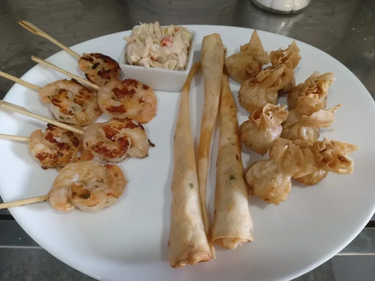 Taleguitas y piruleta de langostinos